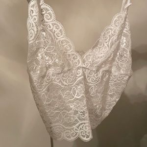 Baby pink satin shorts and lace cami set